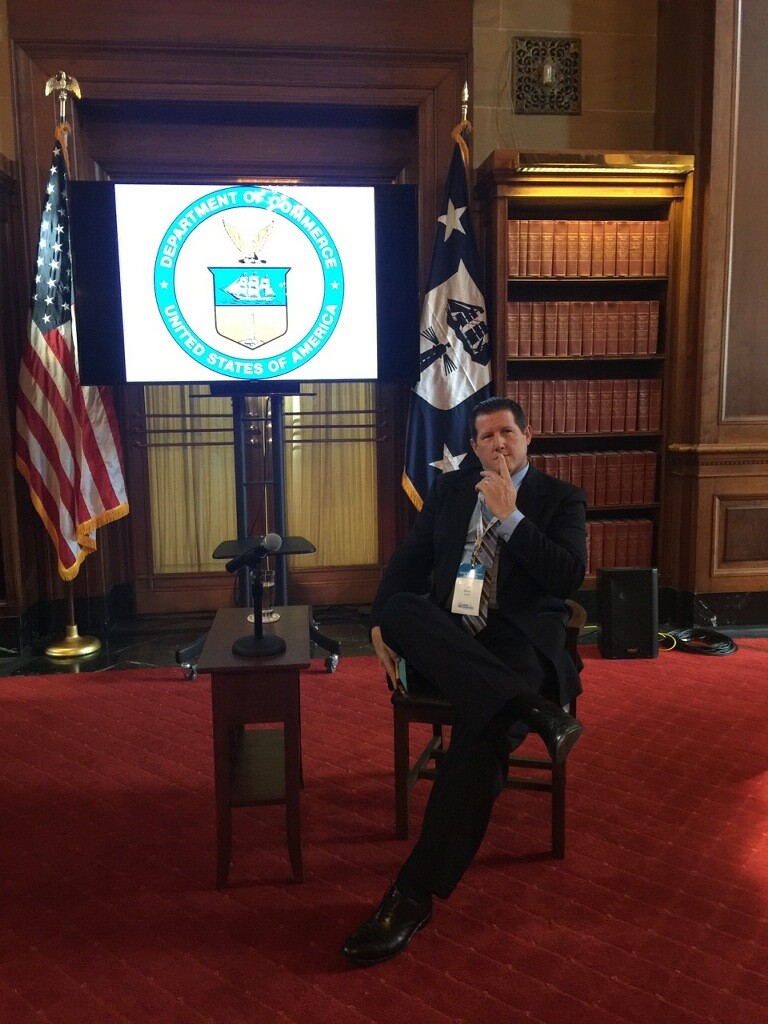 dc vfi visit dept of commerce jeff shuey sitting in the chait waiting for dpty secy